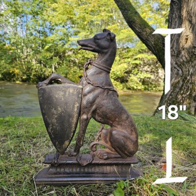 A country house cast iron armorial doorstop